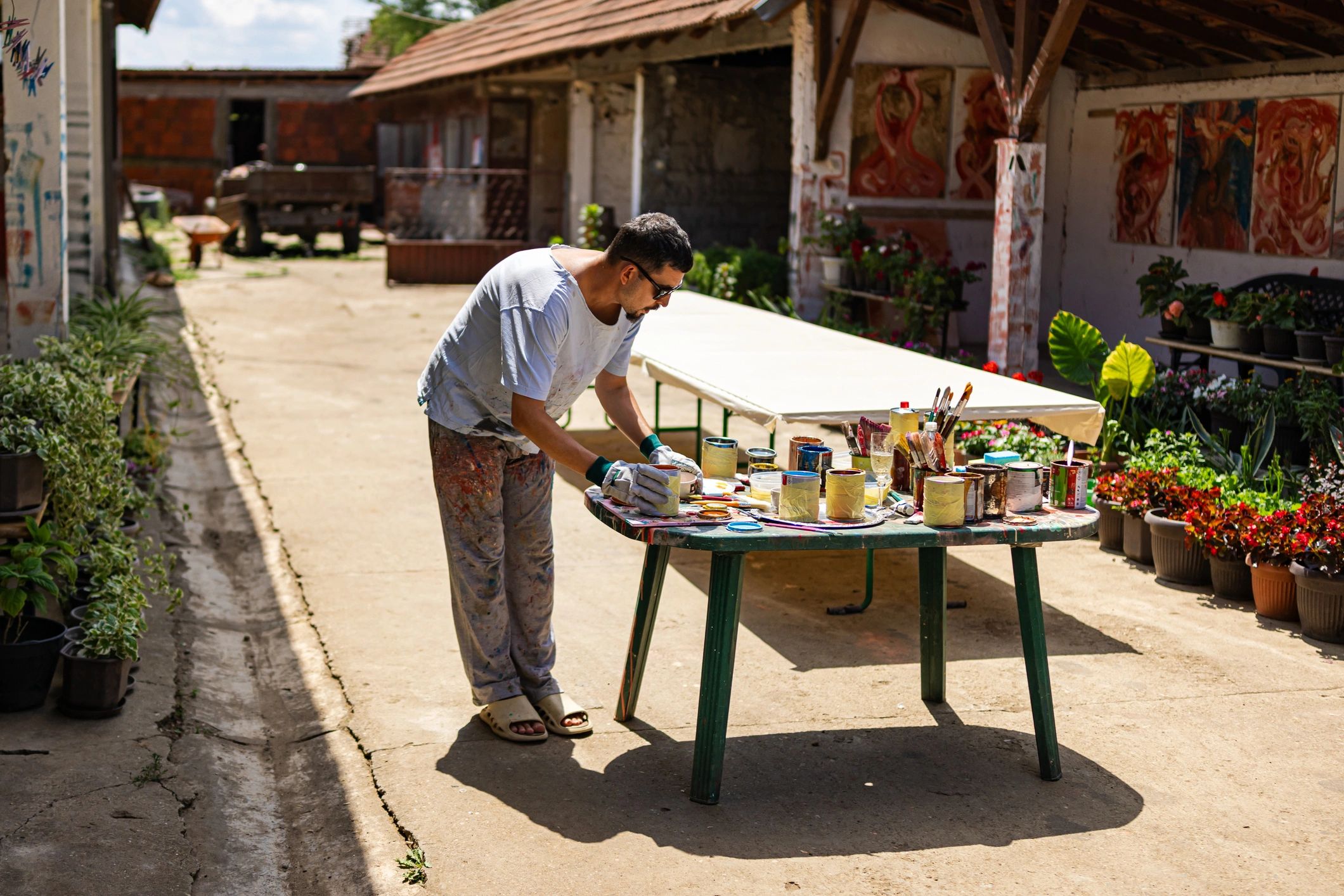 Artist preparing paints in a creative studio